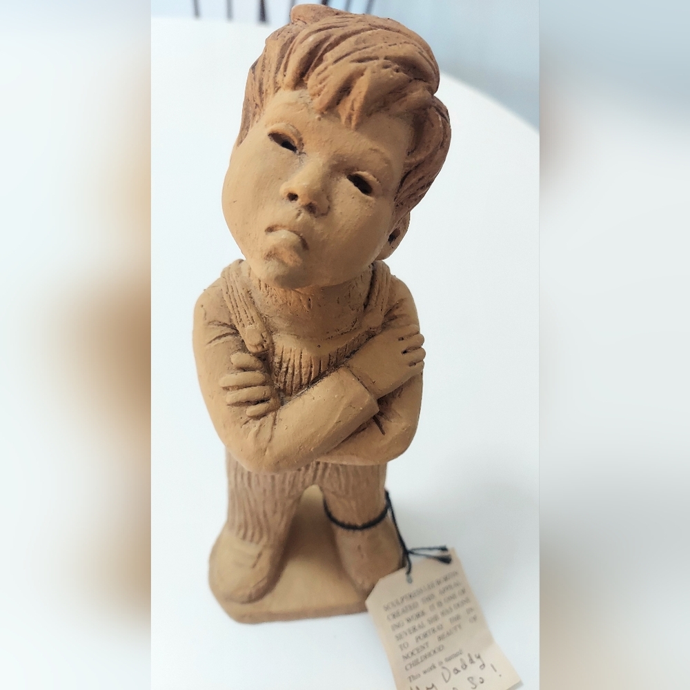 Brown Ceramic Boy Figurine "My Daddy Said So" by Lee Bortin